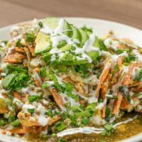 Chilaquiles · Eggs, homemade tortilla chips, ortega chile, onion, and roasted tomatillo salsa scrambled, t...