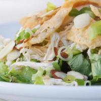 Small Chinese Chicken Salad · Lettuce, Chicken, Almonds, Sesame Seeds, Green Onions, and Wontons. Signature Sesame Dressin...