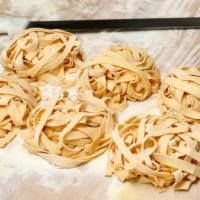 Tagliatelle Pasta · Handmade eggs tagliatelle pasta with your choice of sauce