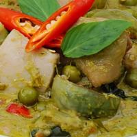 Green Curry · Green curry paste with coconut milk, green beans, eggplant, bamboo, red bell pepper,
and bas...