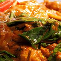 Pad Tan-Khun · Your choice of meat, stir-fried in red curry paste, coconut milk with Chinese eggplant, bell...