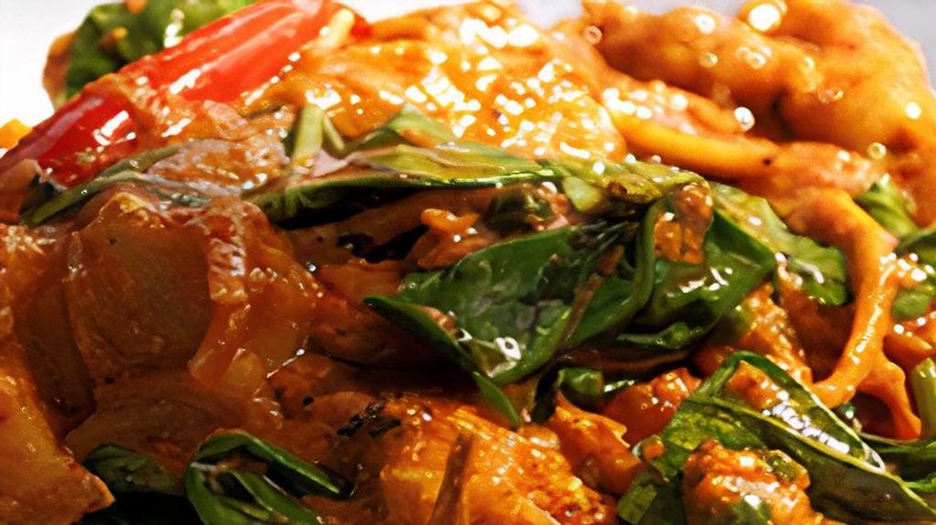 Pad Tan-Khun · Your choice of meat, stir-fried in red curry paste, coconut milk with Chinese eggplant, bell
pepper and sweet basil.