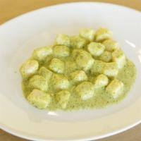 Gnocchi Pesto · Homemade potato dumplings with a classic pesto sauce.