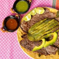 Super Taco De Cecina · Best seller. 

Our best selling taco, includes a plate-size, round, handmade tortilla, black...