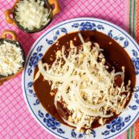 Enchiladas De Mole Poblano (5) · Most popular. Includes five rolled corn tortillas filled with either cheese or chicken. Topp...