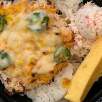 Salmon Baked Bowl · Small baked bowl, 
Salmon Baked with Crab, corn Onions, jalapenos and Mozzarella Cheese  and...