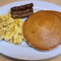 Lighter Breakfast · 2 eggs and 2 pancakes with your choice of bacon or sausage, or  1 ham slice or 1 dish of fru...