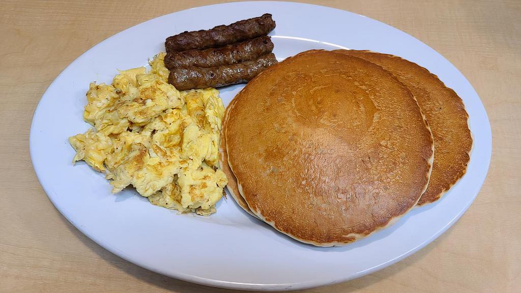 Lighter Breakfast · 2 eggs and 2 pancakes with your choice of bacon or sausage, or  1 ham slice or 1 dish of fruit.