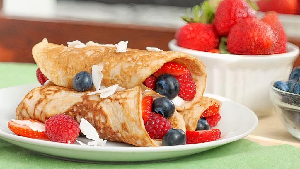 Fruit Crepes Just The Crepes · Two tender crepes topped with fresh made glazed fruit of your choice; Blueberries, Strawberry, or Cinnamon Apple.