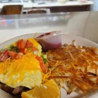New York Steak Omelet · Our 8 oz steak cubed cooked your way, bell peppers, onion, and cheddar and your choice of co...