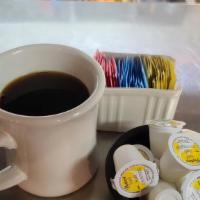 Coffee · A hot coffee in a to go cup. Please specify if you would like creamer we have 1/2 and 1/2, h...