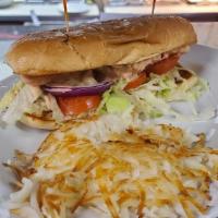 Buffalo Chicken Sandwich · Served on a French roll, grilled chicken, homemade buffalo sauce, with lettuce, tomatoes, on...