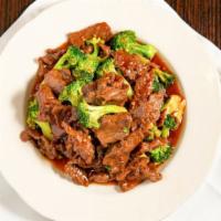 Broccoli Beef · Served with rice.