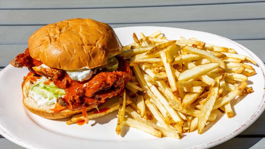 Chicken Sandwich With Fries · Chicken tossed in your choice of flavor, topped with lettuce, pickles, ranch dressing and served on a brioche bun.