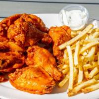Wings & Fries (10 Pc) · Includes wings, fries and dipping sauce.
