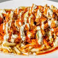 Flava Fries · Fries topped with chicken drizzled with flava and sauce of your choice.