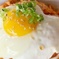 Kimchi Fried Rice · Pan fried rice with kimchi and pork with sunny side up egg on the top.