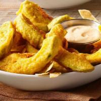 Avocado Fries · Fresh avocado slices tempura-battered and fried to order. Served with a side of creamy red c...