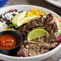 Grilled Steak Border Bowl · Grilled steak brushed with lime-cilantro chimichurri, cilantro lime rice, black beans, pickl...