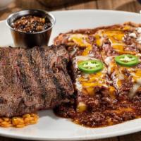Ranchiladas · A 9 oz. mesquite-grilled steak served with roasted red chile tomatillo salsa, plus two hand-...
