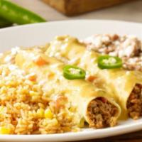 Border Queso Beef Enchiladas · Two seasoned ground beef enchiladas topped with our border queso. Served with Mexican rice a...