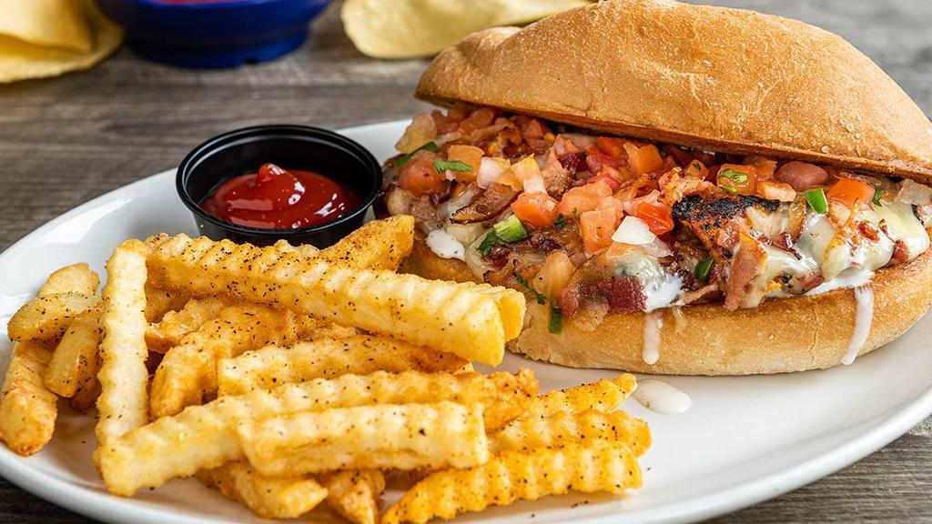 Monterey Ranch Chicken Torta · Mesquite-grilled chicken smothered with melted Jack cheese, crumbled bacon and ranch dressing in a toasted bolillo roll. Served with fries.