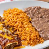 Enchilada Plate · 660-830 cal. Pick your enchilada - beef, chicken, or cheese. Served with Mexican rice and re...
