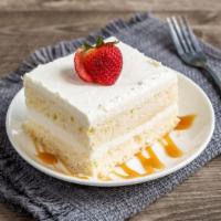 Tres Leches Cake · A Mexican tradition. A light cake soaked in three kinds of sweet milk,  topped with whipped ...