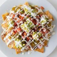 Nachos Supreme · Corn Tortilla Chips, Topped with Mozzarella, Cheddar, Beans, Gucamole, Pico De Gallo, Sour C...