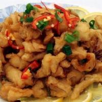 Fried Squid 椒盐鲜鱿 · With spicy salt. Deep and stir-fried squid with green onion, chili, salt, and peppers.