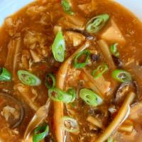 Hot & Sour Soup 酸辣汤 · A spicy combination of flavors of wood ear mushroom, tofu, bamboo shoots, and in a rich egg ...