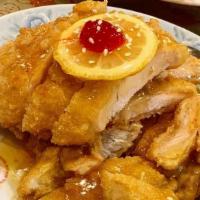 Fried Chicken Breast 柠檬鸡 · With lemon sauce and sesame. Fried chicken breast cutlet topped with tart lemon sauce.