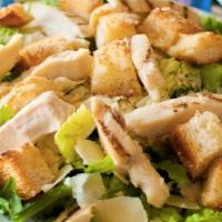 Grilled Chicken Caesar Salad · Chicken breast strips, Romaine lettuce, Parmesan cheese, and homemade croutons with a creamy...