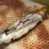 Baked Sandwich · Our baked sandwiches are filled with choice of one meat option, mayo, mozzarella, and Americ...