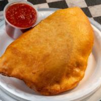 Vegetarian Calzone · Cheese, mushrooms, bell peppers, onions, olives, and tomatoes.