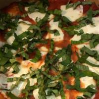 Margherita · Fresh mozzarella and pizza sauce topped with basil.