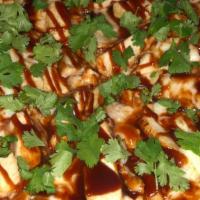 B.Q. Chicken · Chicken, onion, B.B.Q. sauce and mozzarella, topped with cilantro.