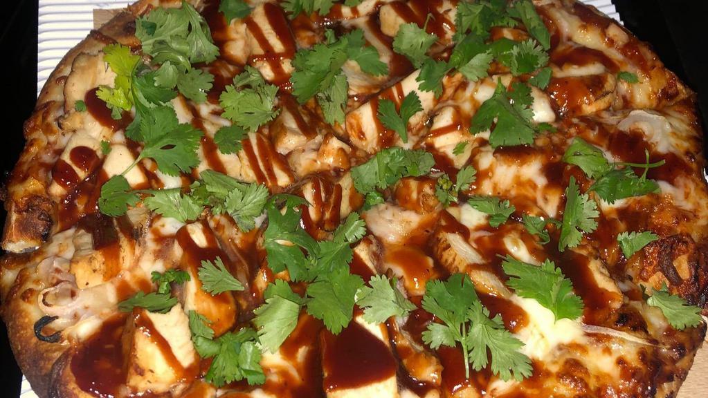 B.Q. Chicken · Chicken, onion, B.B.Q. sauce and mozzarella, topped with cilantro.