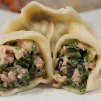Chinese Spinach And Pork Dumpling · 8 pieces Chinese Spinach and Pork Boiled Dumpling with House Special Sauce