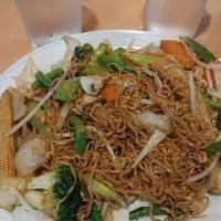 Thai Chow Mein · Thai style pan-fried egg noodles with cabbage, onion, bean sprouts, and carrots in light bro...