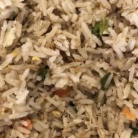 Thai Fried Rice · Wok-fried rice with egg, onion, green onions, and carrots.