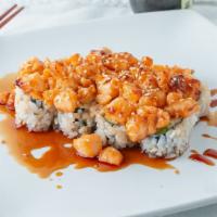 S.C. Roll · California roll topped with baked bay scallops, and sweet