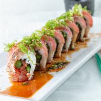 Devil'S Dream Roll · Spicy tuna and asparagus inside, seared tuna, and spicy ponzi sauce on top.