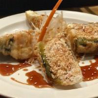 Stuffed Jalapeño Sushi Bar Special · Deep-fried jalapeño stuffed with mixed crab and cream cheese topped with sweet sauce.
