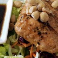 Chinese Salmon Salad · Topped with Salmon, lettuce mix, carrots, red cabbage, celery and peanuts with soy-sesame vi...
