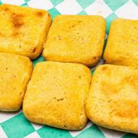 Paneer Pakora (4 Pcs) · Large squares of paneer breaded and baked to a golden brown.