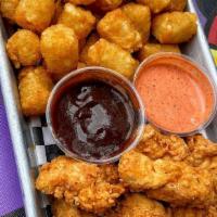Chicken Nuggets · 10 pc nuggets
1 side
1 dipping sauce