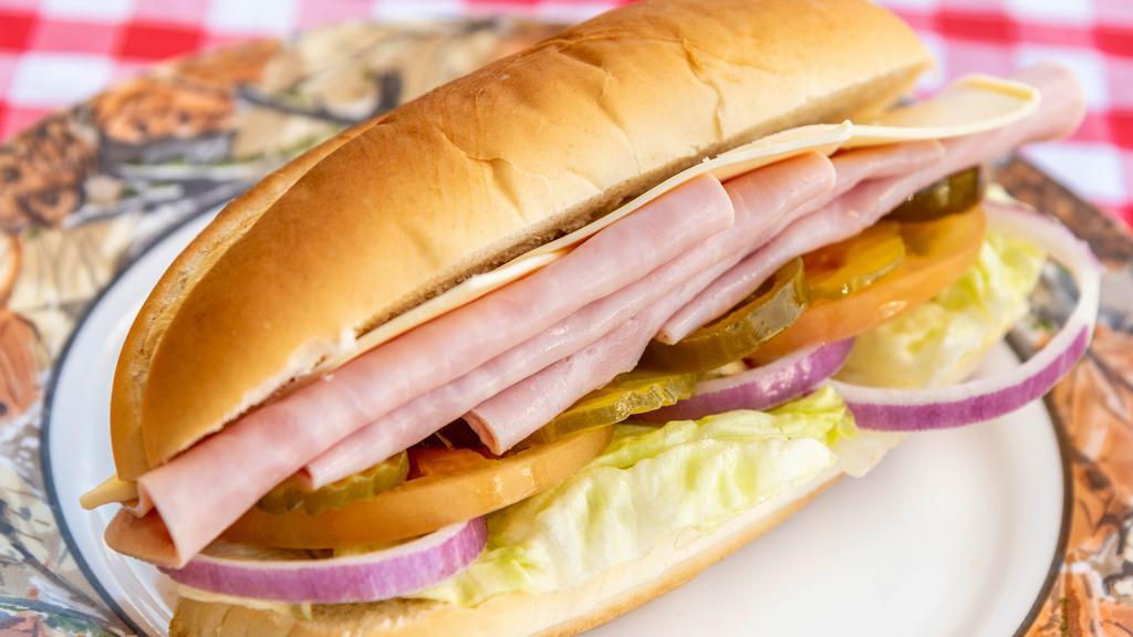 Ham & Swiss Cheese Sandwich · Mayo, mustard, lettuce, tomato, onion, pickles, jalapeño.