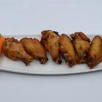 Plain Chicken Wings · Jumbo Bone In wings marinated overnight, slow cooked, then deep fried golden brown. Served w...