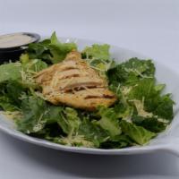 Chicken Caesar Salad · Crisp cold Romaine lettuce, grilled chicken, shredded parmesan cheese, creamy caesar dressin...